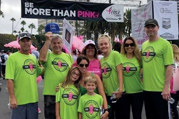 Ginger (center) surrounded by her family during Race for the Cure