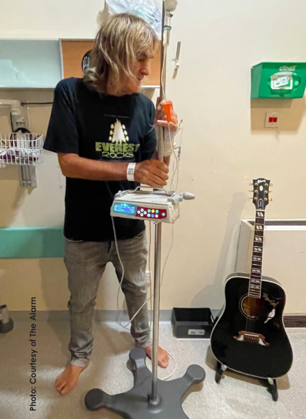 Mike at the hospital with his guitar
